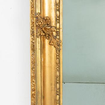 A Rococo style mirror, second half of the 19th Century.