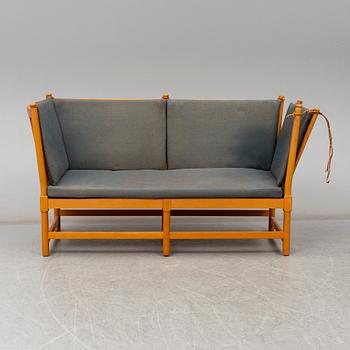 A "Tremme" sofa and armchair, designed by Børge Mogensen, Fritz Hansen, second half of the 20th century.