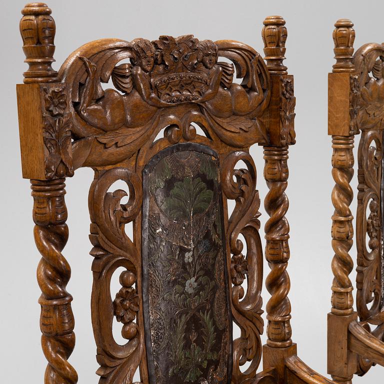 A pair of Baroque style armchairs, circa 1900.