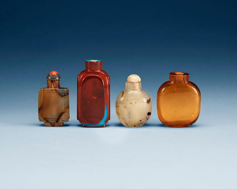 A set of four glass and stone snuff bottles, Qing dynasty.