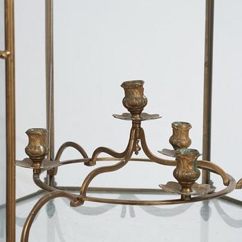 A Swedish rococo gilt-brass four-light lantern, possibly a masterpiece, Stockholm, later part of the 18th century.