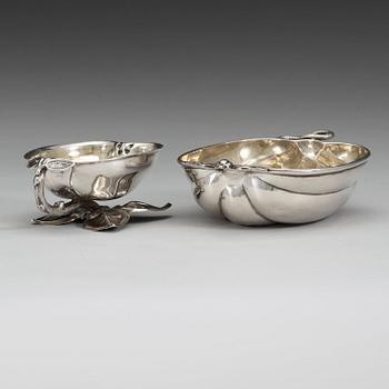 Two Russian mid 19th century parcel-gilt dishes, marked Carl Ekqvist, S:t Petersburg and unidentified maker, Moscow.
