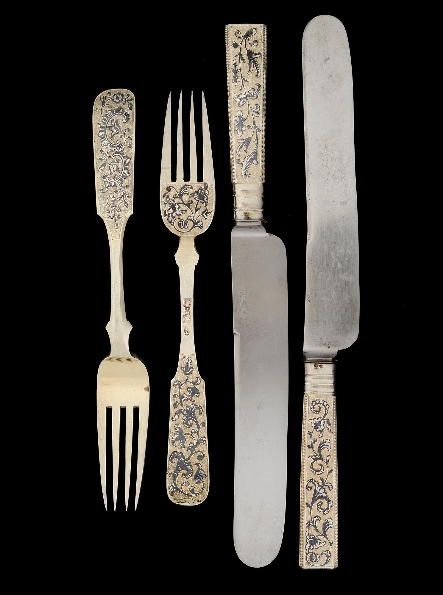 48 PIECES OF GILT SILVER AND NIELLO CUTLERY, Moscow 1842, unknown master, weight without knives 2036 g.
