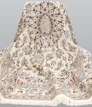 A Nain part silk carpet, 244 x 156 cm.