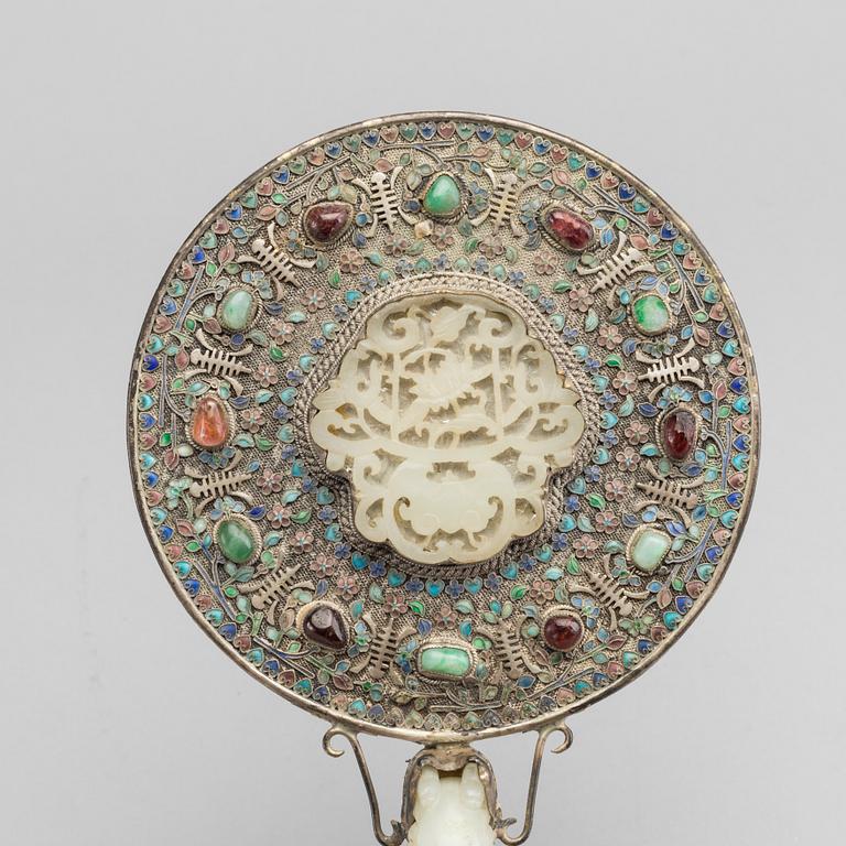 A Chinese silver mirror with carved nephrite placque and belt hook, early 20th Century.