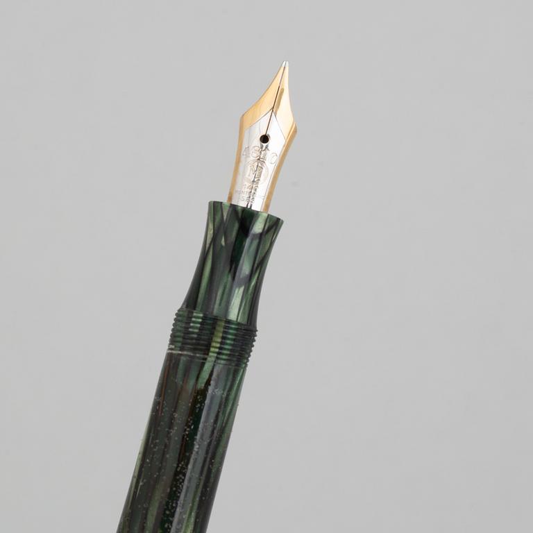 Montblanc, a fountain pen and a pencil in a leather case, 1950's.