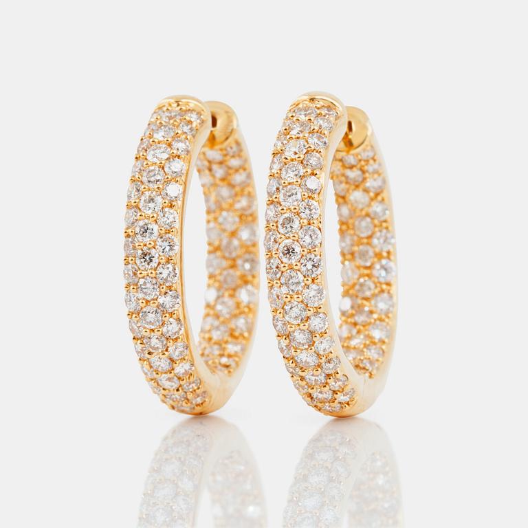 A pair of diamond hoop earrings, 2.65 cts according to engraving.