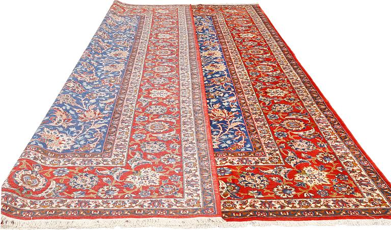 A fine Isfahan carpet of 'Shah-Abbas' design, c 418 x 307 cm.