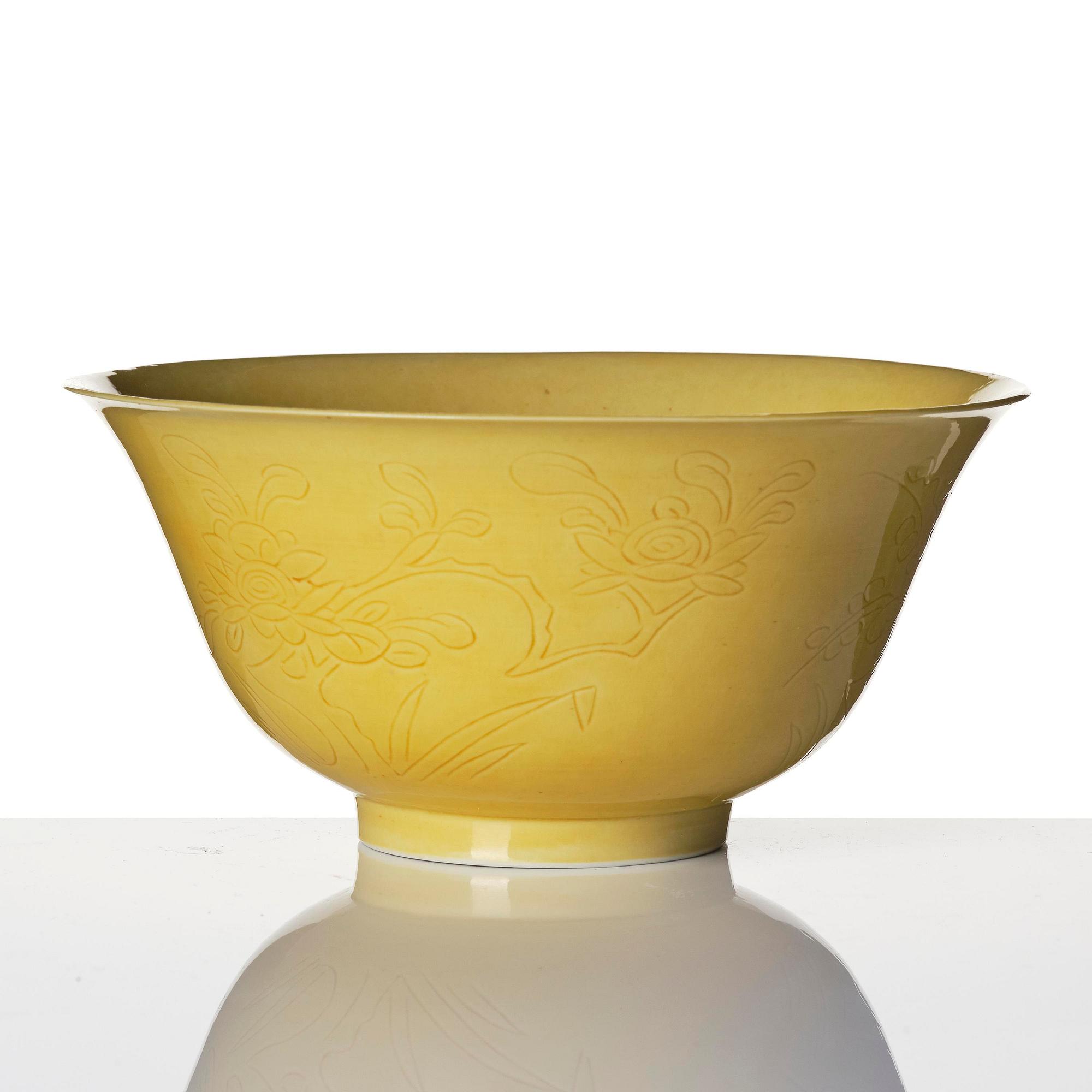 A yellow glazed 'prunus' bowl, Qing dynasty, 18th century.