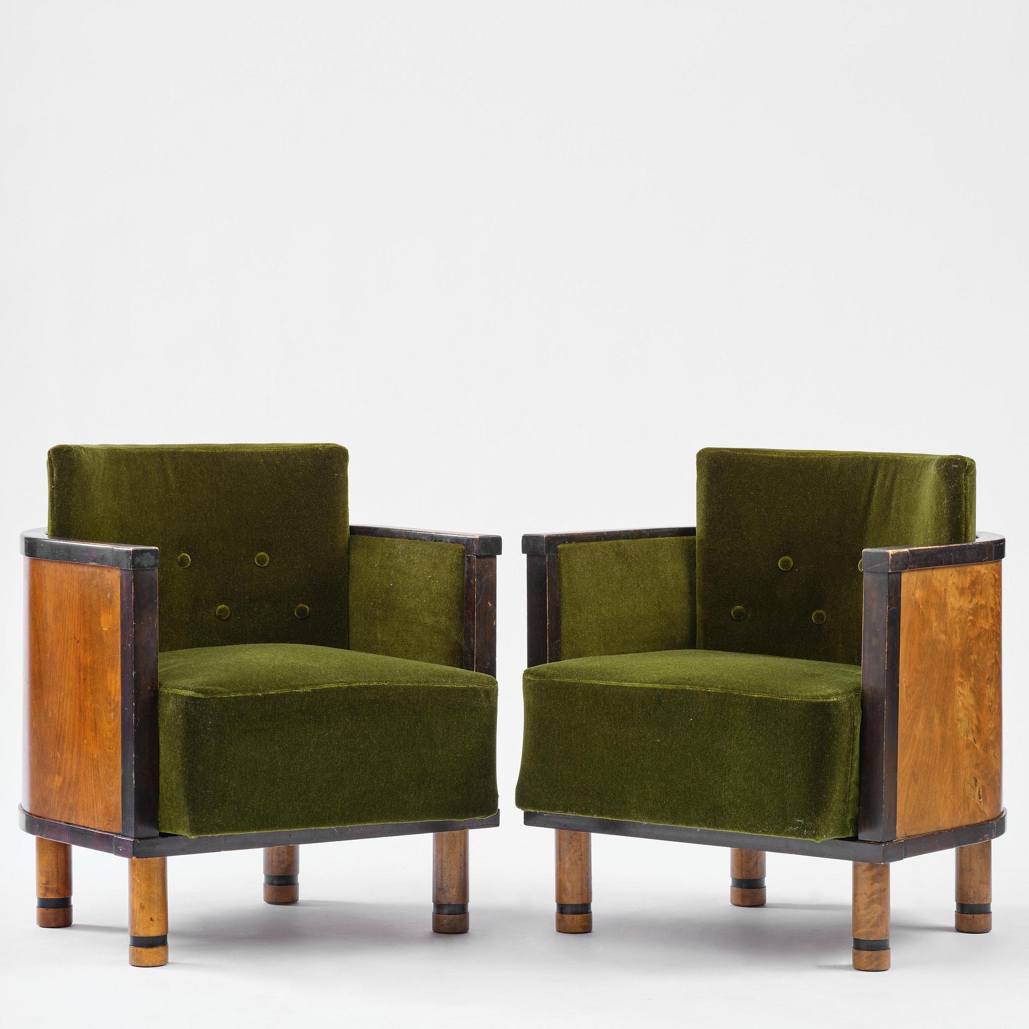 A pair of 1930s birch armchairs.