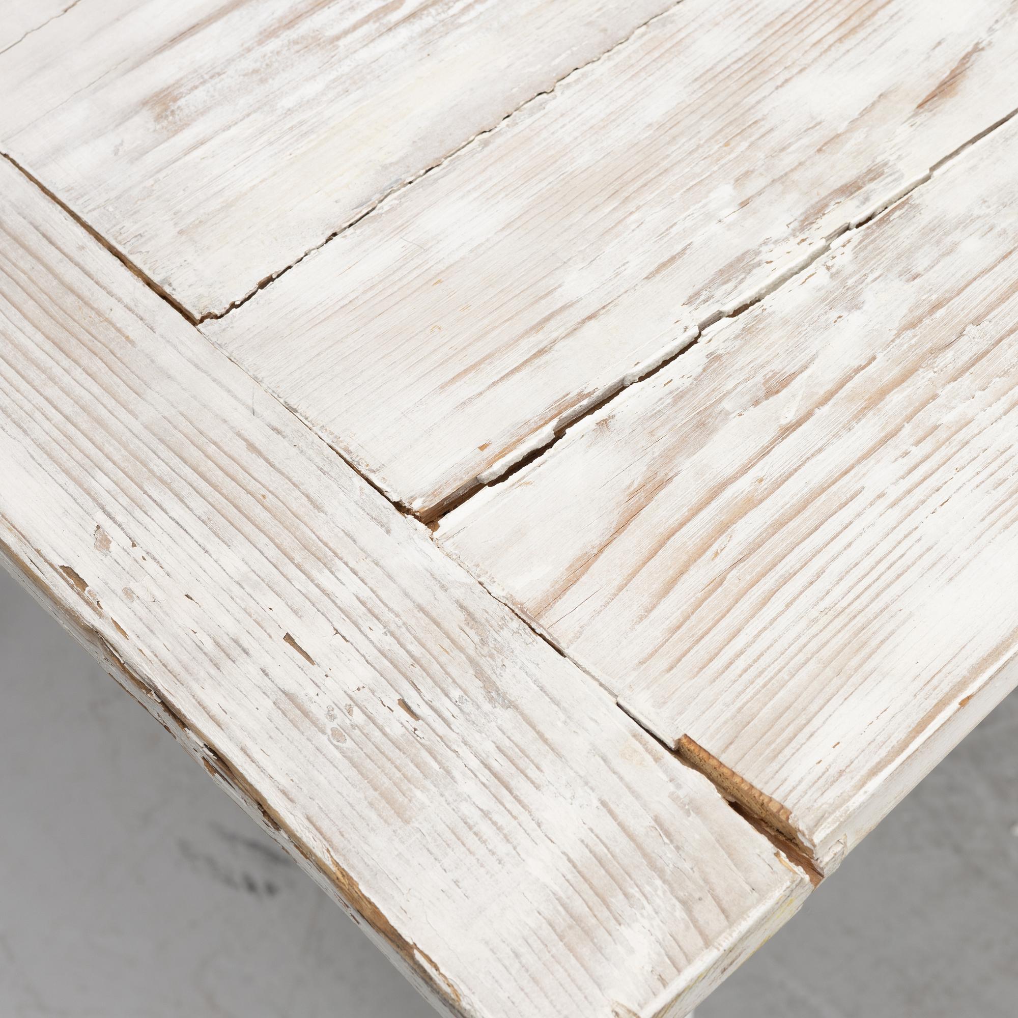 A table with stools, 20th/21st century.