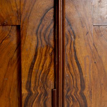 A 19th century walnut veneered  book cabinet.