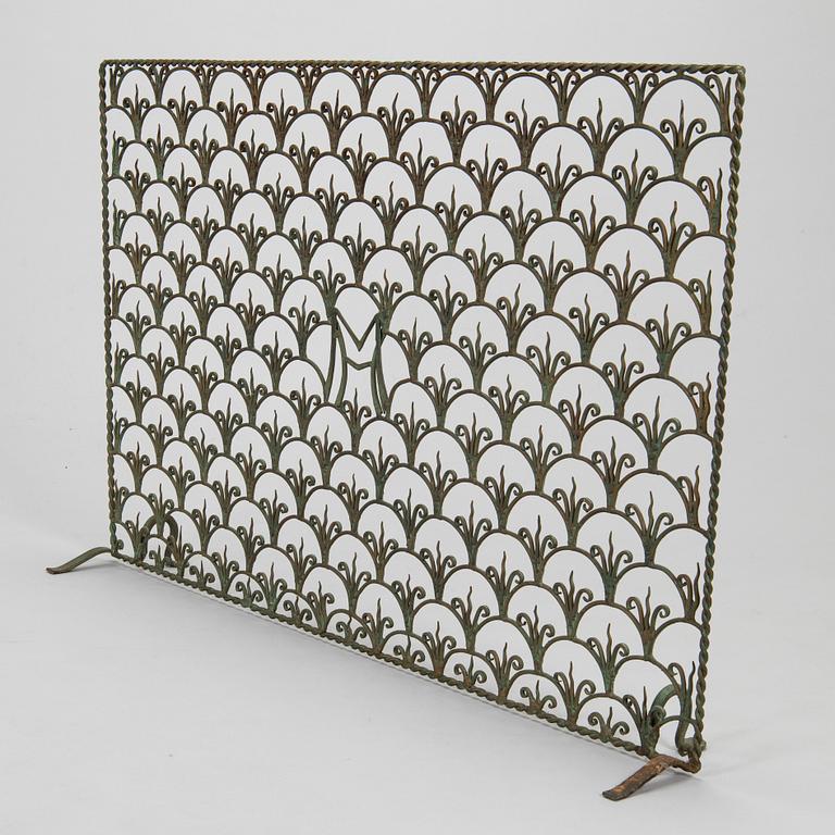 A radiator cover, metalwork, likely Taidetakomo Hakkarainen, 1930s.