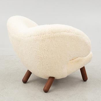 Finn Juhl, a' Pelican Chair' armchair, House of Finn Juhl, Denmark.