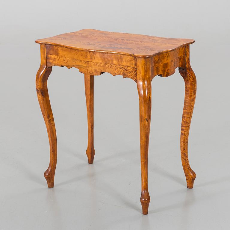 A Rococo style table late 19th century.