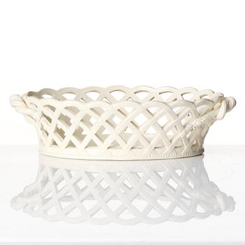 A latticed creamware chestnut basket with stand, 19th century.
