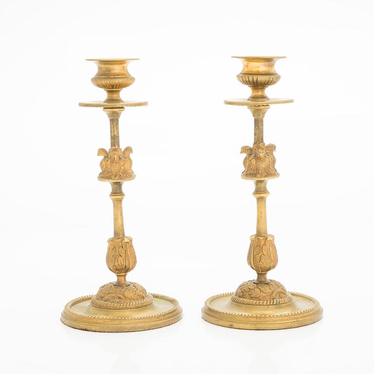A pair of early 20th century candlesticks.