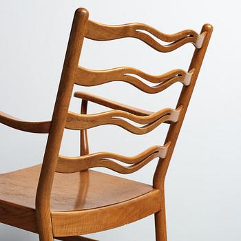 Ole Wanscher, a pair of walnut armchairs, model 1755 for Fritz Hansen, Denmark 1945.