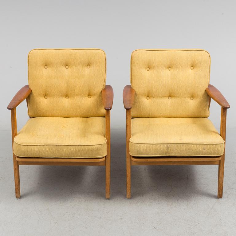 A pair of oak and teak 'Esbjerg' easy chairs from IKEA, 1950's/60's.