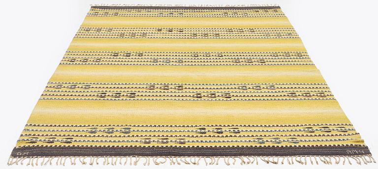 Anna Maria Hoke, a carpet, tapestry weave, c. 267 x 160 cm, signed GH AMH.