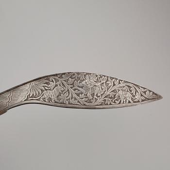 KUKRI samt YXA, indopersiska, stål, 1900-talets första hälft.