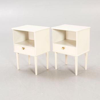 A pair of painted 1950s bedside tables.