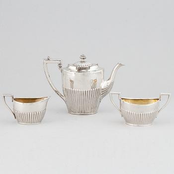 A silver mocha pot, creamer and sugar bowl, swedish import mark of NL Dahlström & Co, Örebro 1930.