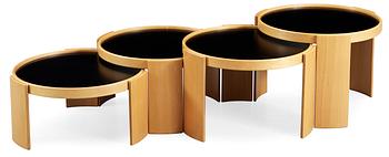 A Gianfranco Frattini stacking tables, (four pieces) with beech and laminate tops, by Cassina, Italy.