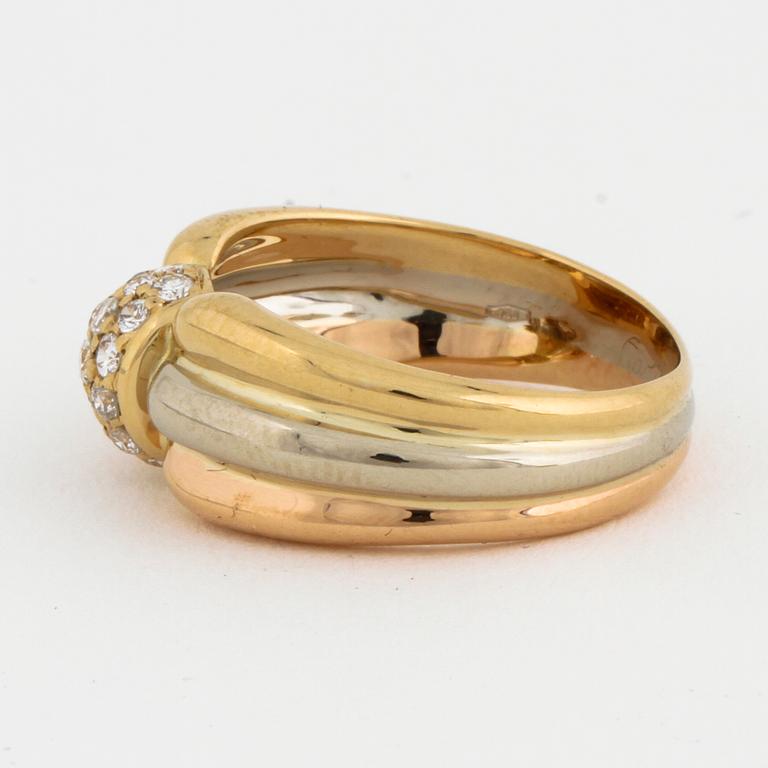 A brilliant cut diamond ring by Cartier.