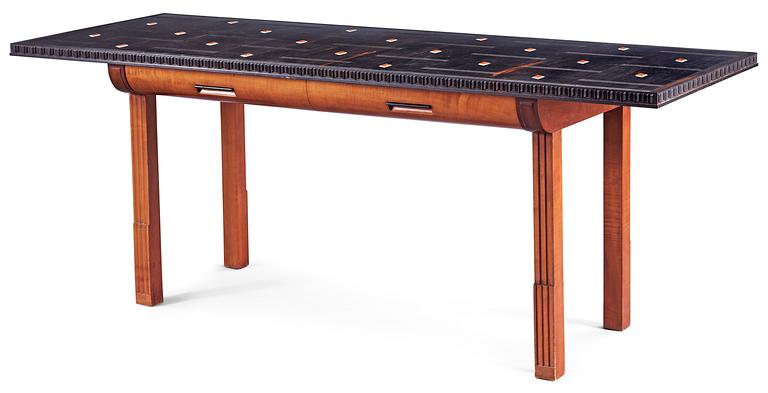 A Hjalmar Jackson ebony and pear wood desk / library table, Stockholm 1934, possibly designed by Oscar Nilsson.