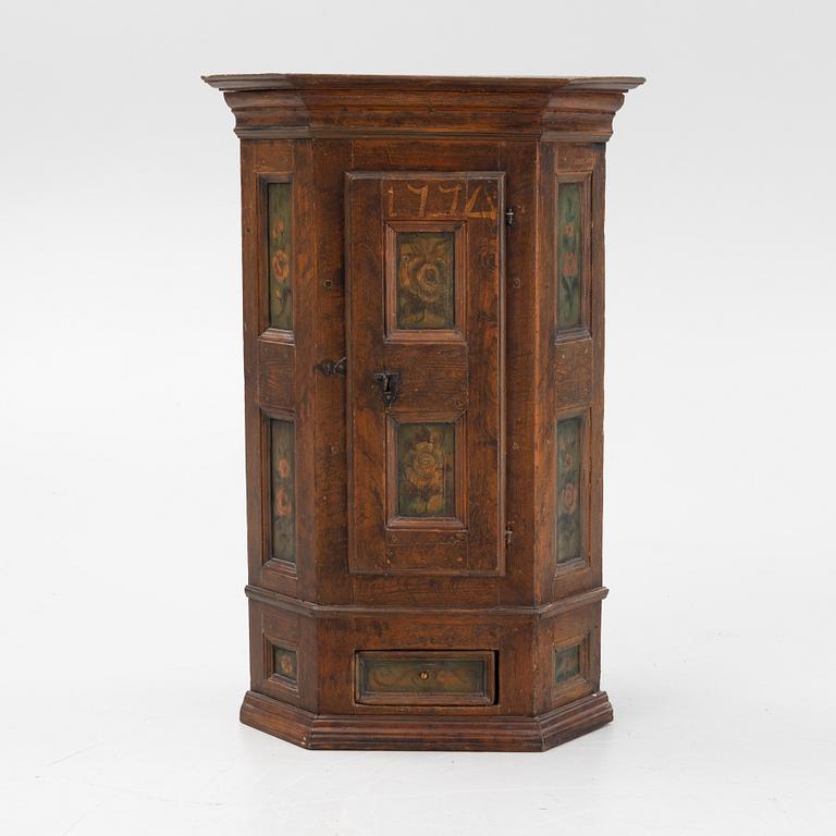 A Swedish provincial pine cabinet, dated 1770.