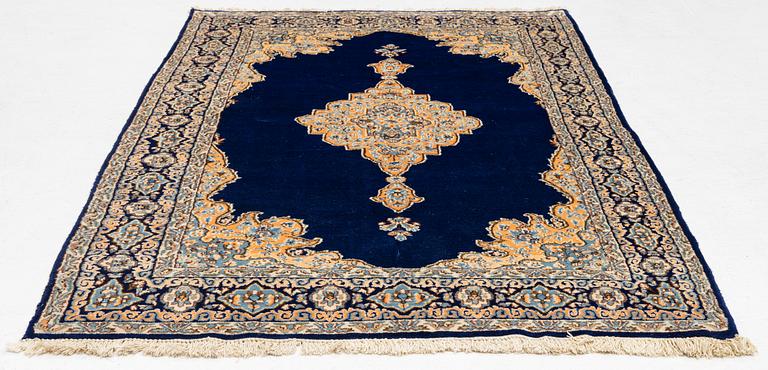 An old Kerman rug, ca. 249 x 148 cm.