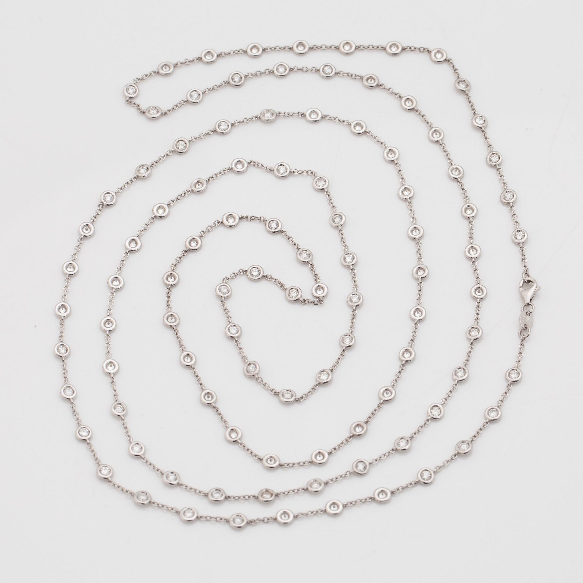 A btilliant cut diamond necklace. Total carat weight circa 4.95 cts. Quality circa H/SI.
