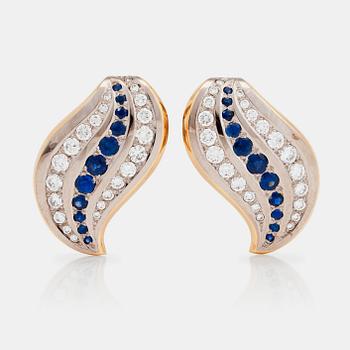 1208. A pair of sapphire and diamond earrings.