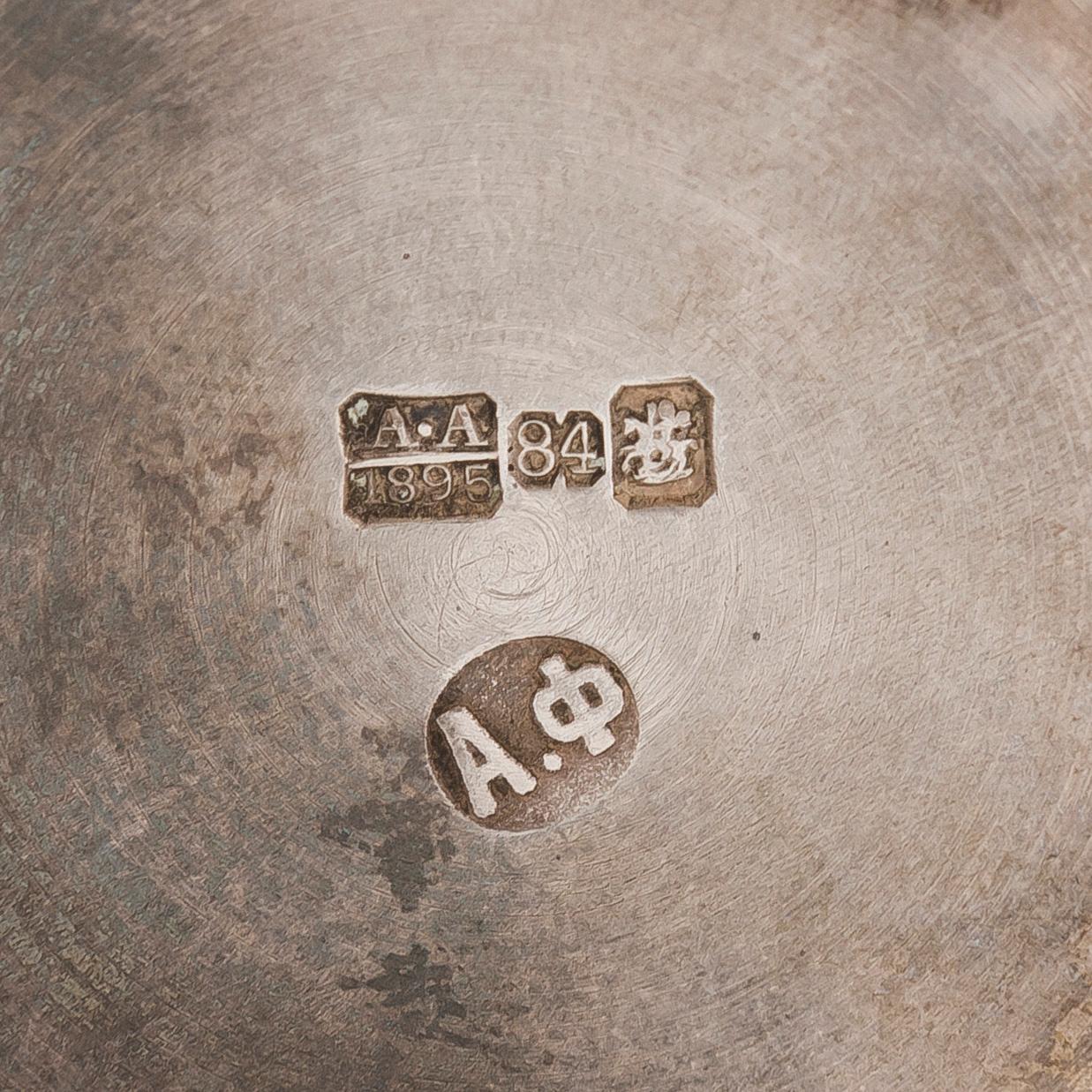 Alexander Fuld, a parcel-gilt beaker, Moscow 1895. In an oak case marked I.E. Morozov St. Petersburg.