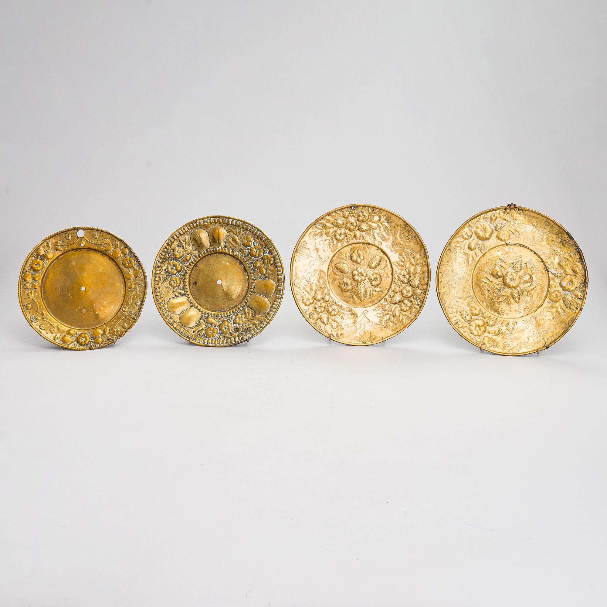 Four mid-17th century Northern and Central European reflectors plates.