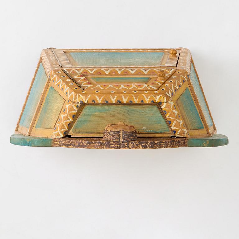 Gérard Rigot, a painted and carved oak cabinet, exectued in his studio, France, second half of the 20th century.