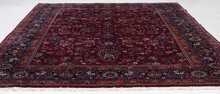 A Meshed carpet, c. 393 x 305 cm.