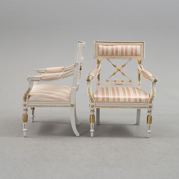 A set of two armchairs, a sofa, a stool and a chair. Early 20th century.