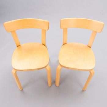 A Set of Three model 69 Chairs by Artek, late 20th Century.