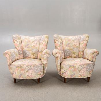 A pair of 1940s easy chairs.