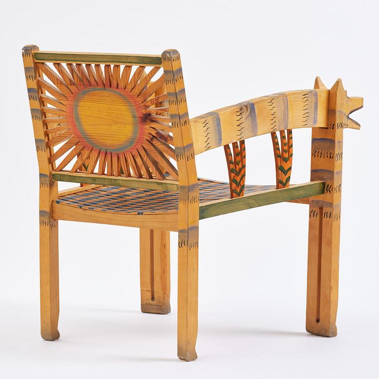 Gérard Rigot, a sculpted and painted oak chair, exectued in his studio, France, second half of the 20th century.