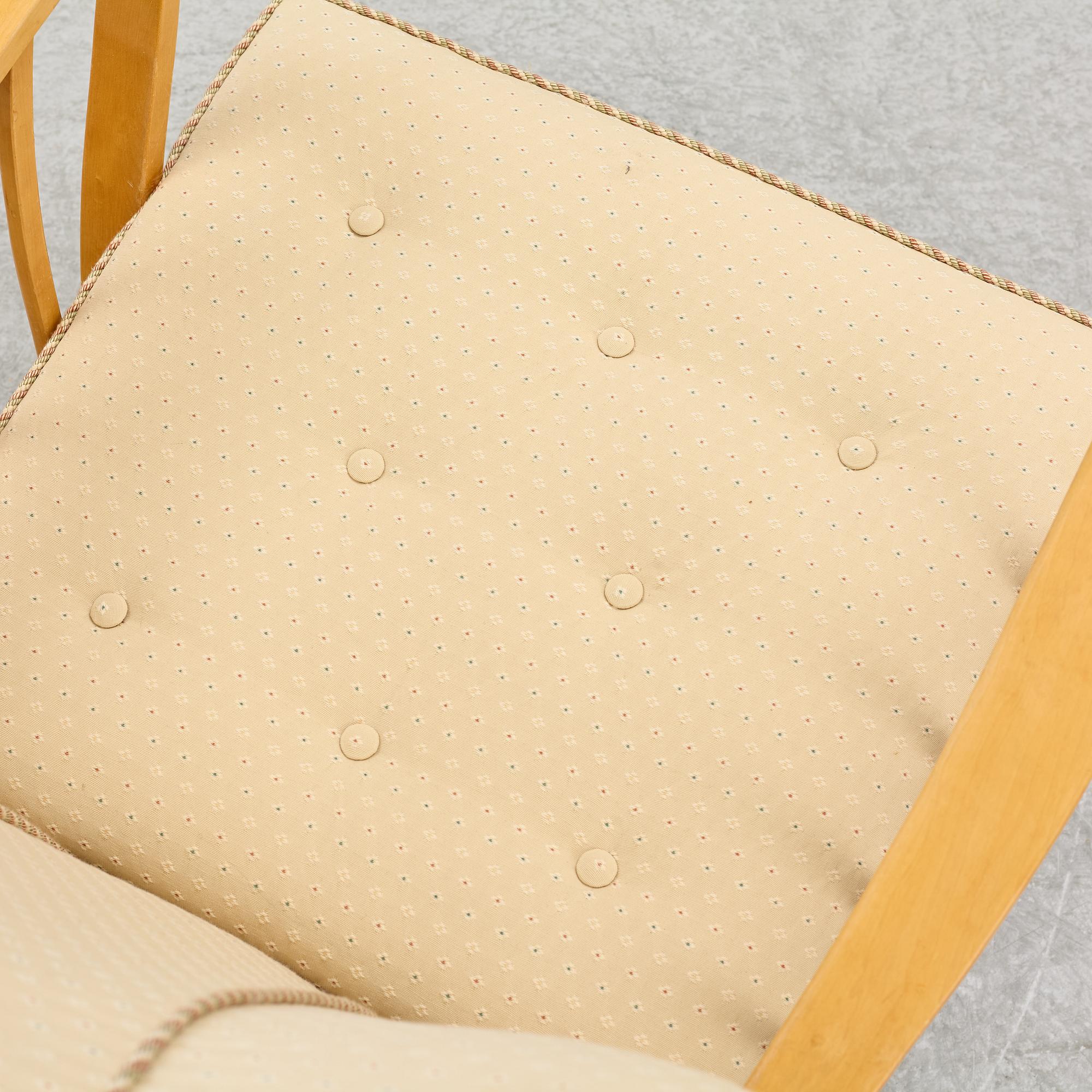 A pair of 1940s Swedish Modern armchairs.