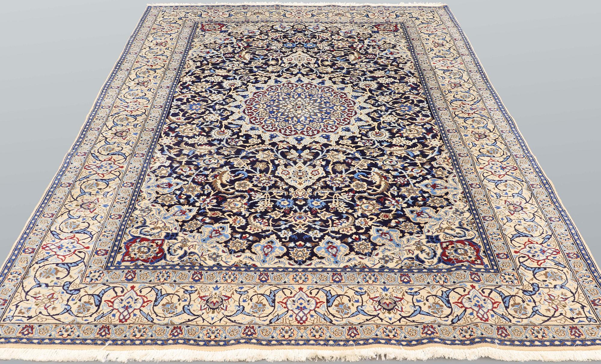 A carpet, Nain part silk so called 9 LAA, ca 322 x 211 cm.