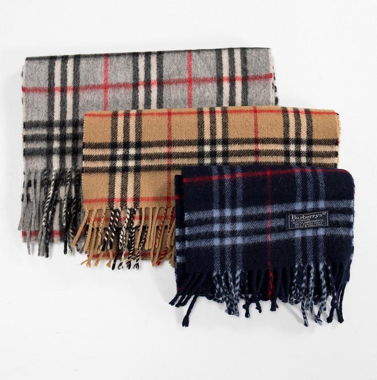 Burberry, three scarves.