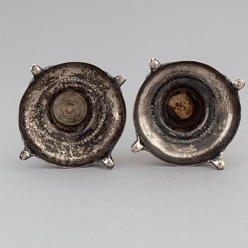 A pair of silver candlesticks, circa 1900.