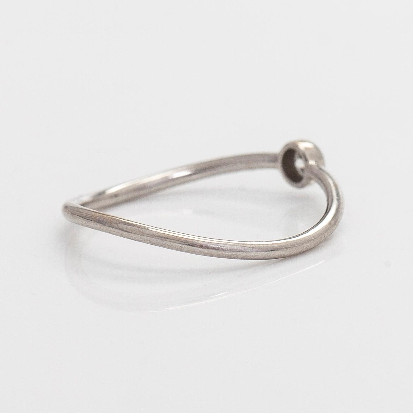 Tiffany & Co, Elsa Peretti, ring, "Wave", platina med briljantslipad diamant.