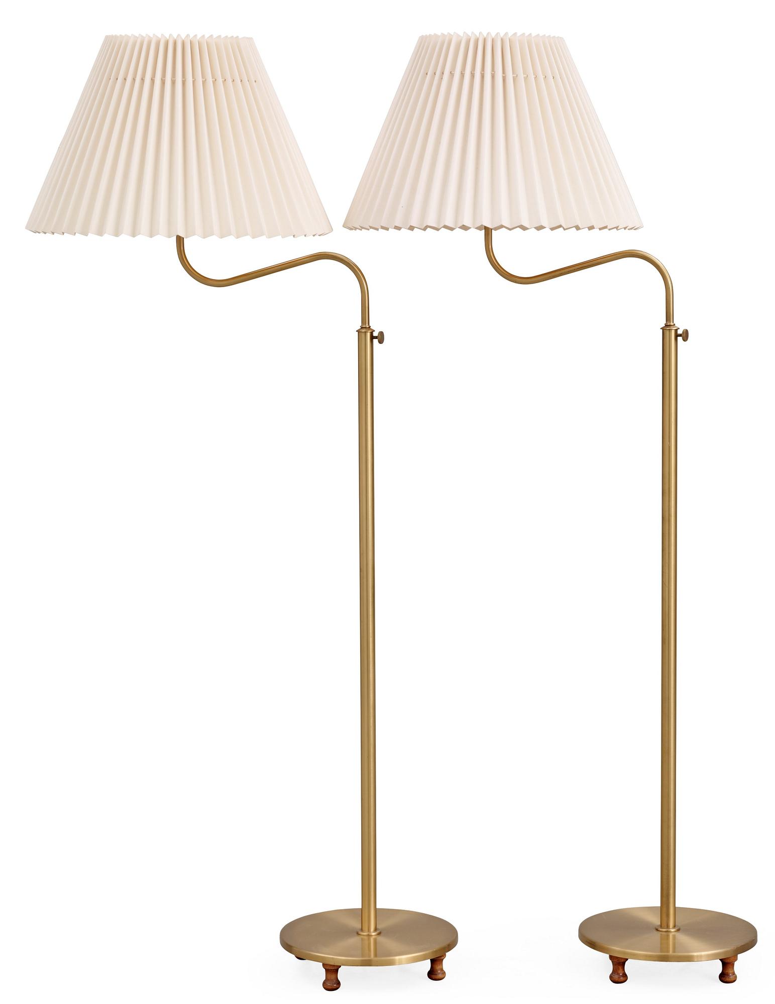 A pair of Josef Frank brass floor lamps, Svenskt Tenn, model 2568.