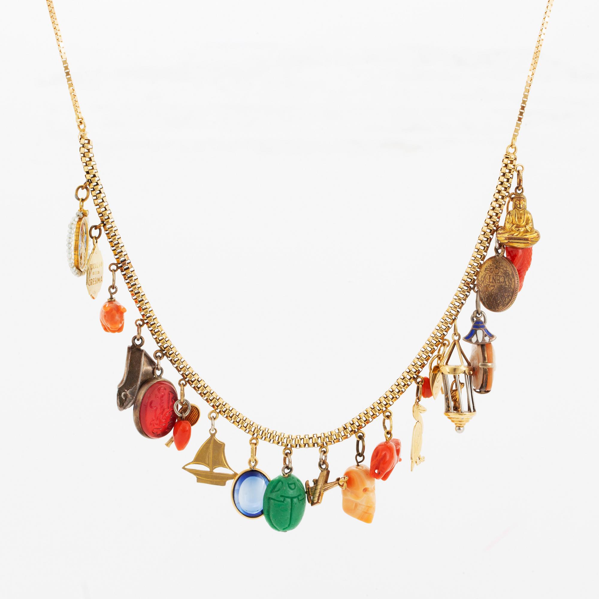 18K gold necklace with charms.