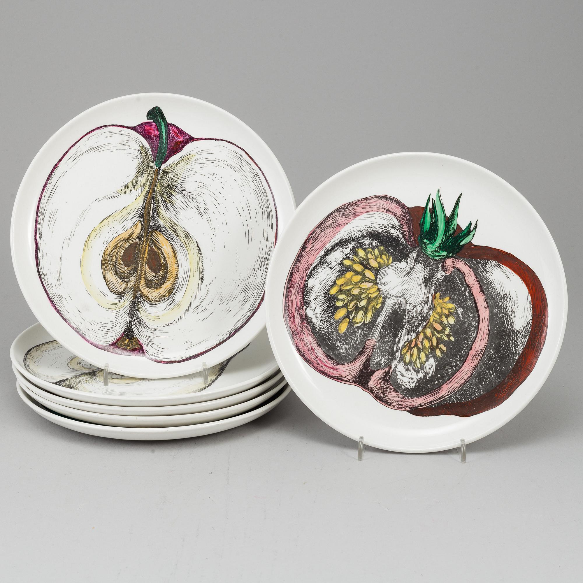 FORNASETTI, eight 'Sezioni di Frutta' ceramic plates, Milan, Italy, 1950's.